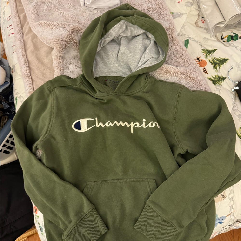 Like new boys medium Champion hoodie.